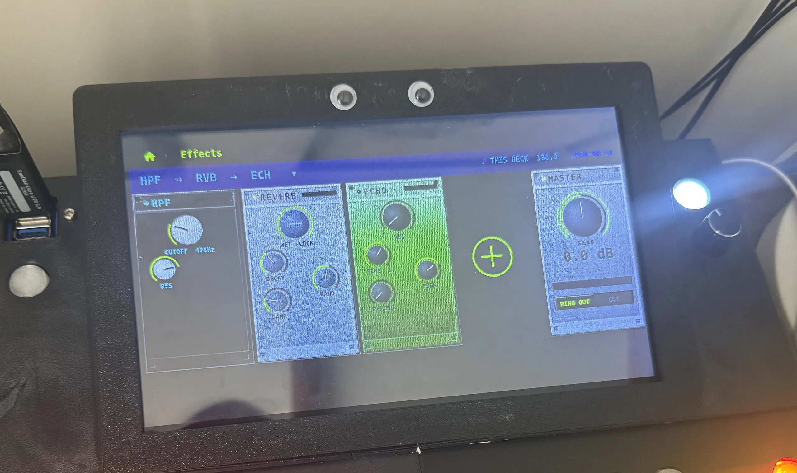 The deck's screen showing three effect cards labelled HPF, REVERB and ECHO with round knobs, a plus sign to add another, and a MASTER card reading 0.0 dB.